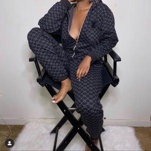 SAVAGE FENTY LOGO UNISEX ONESIE